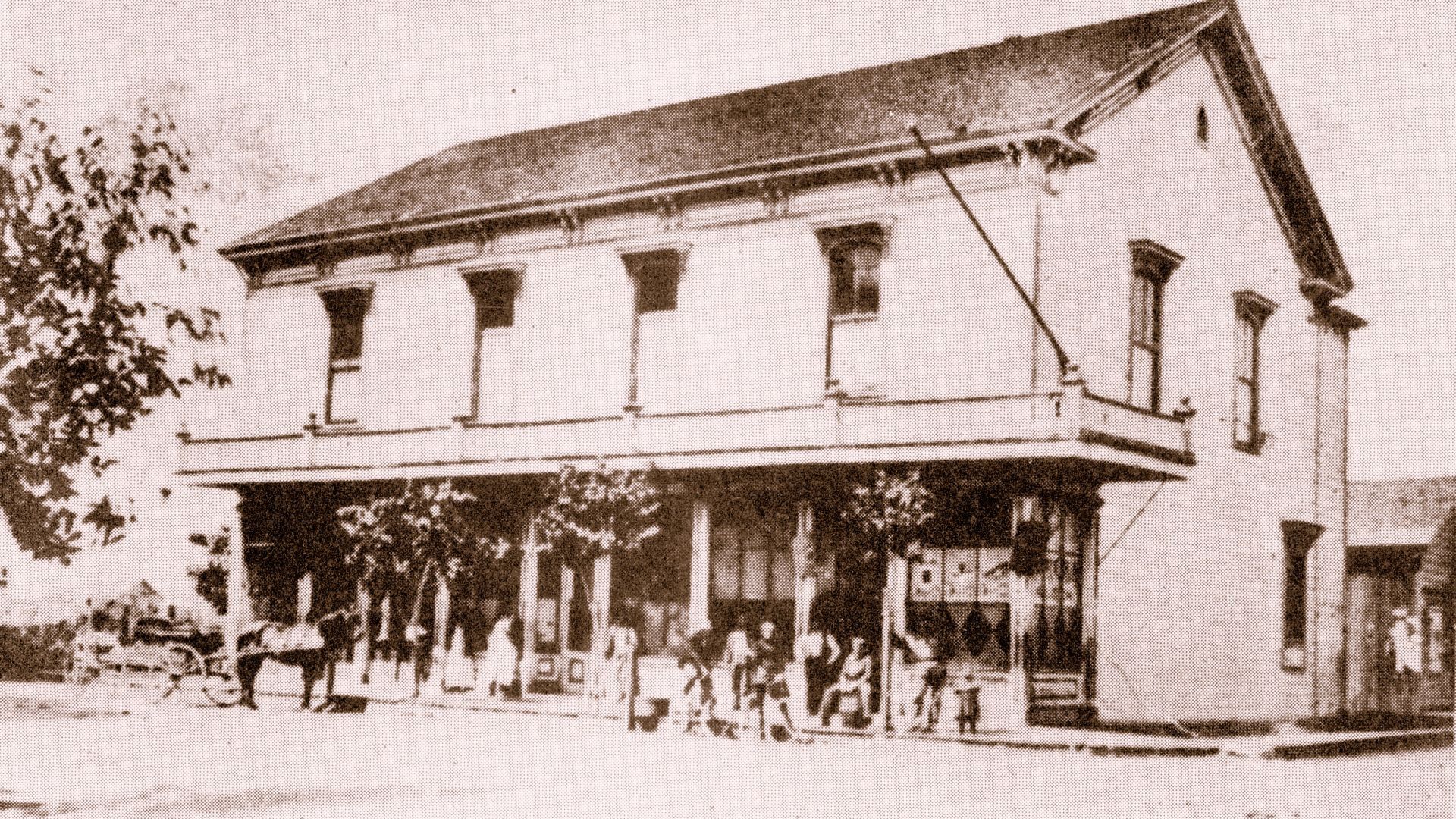 Black and white photograph of a historic hotel