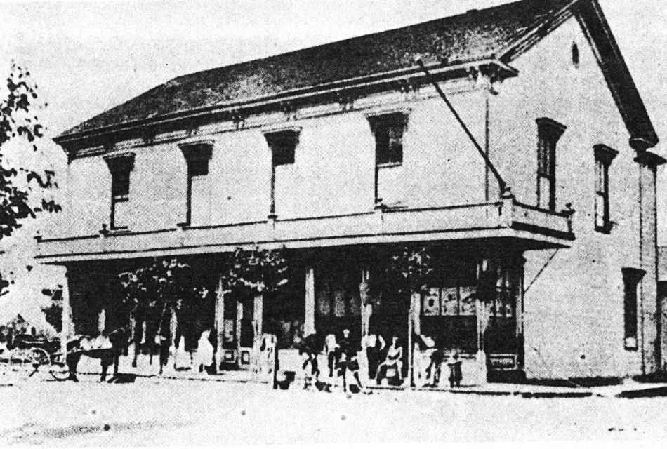 Black and white photograph of a historic hotel